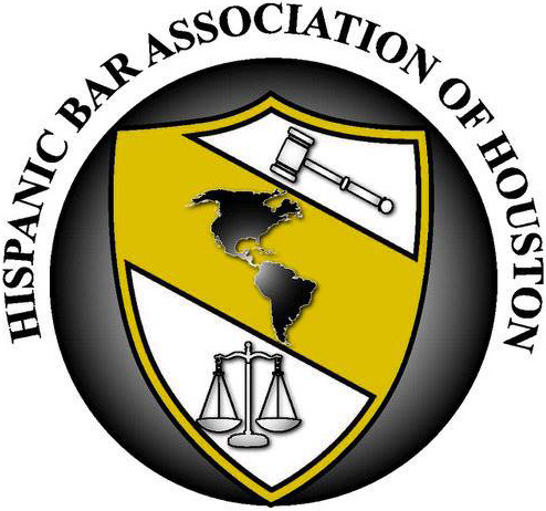 Logo of the Hispanic Bar Association of Houston featuring a shield with an image of the Americas, a gavel, and scales of justice. The shield is gold and white, encircled by the association's name.