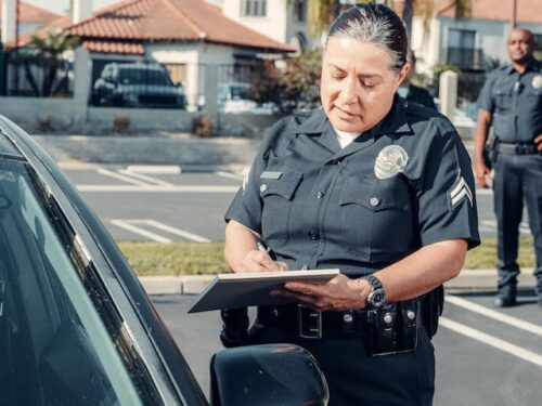 police officer talking to driver